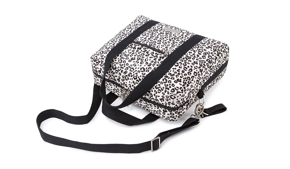 Sac a langer leopard blanc noir