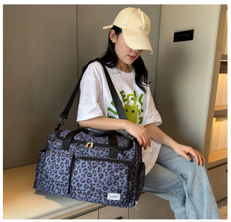 Sac langer léopard femme