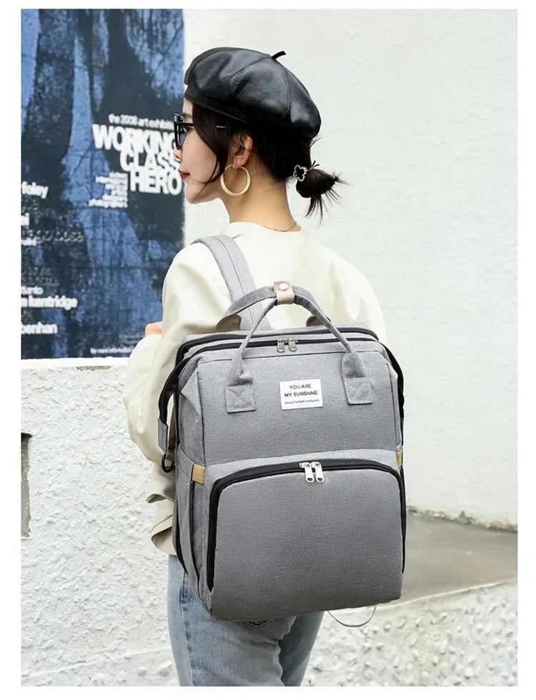 gris sac a dos langer lit bebe