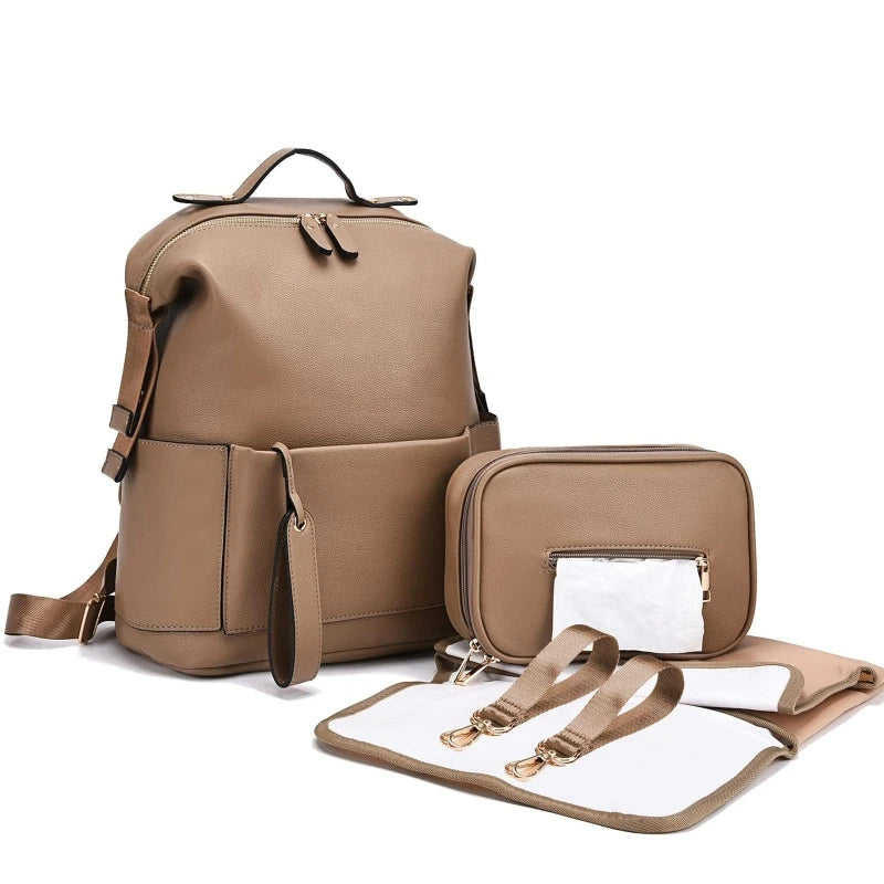 sac a langer en cuir​ marron