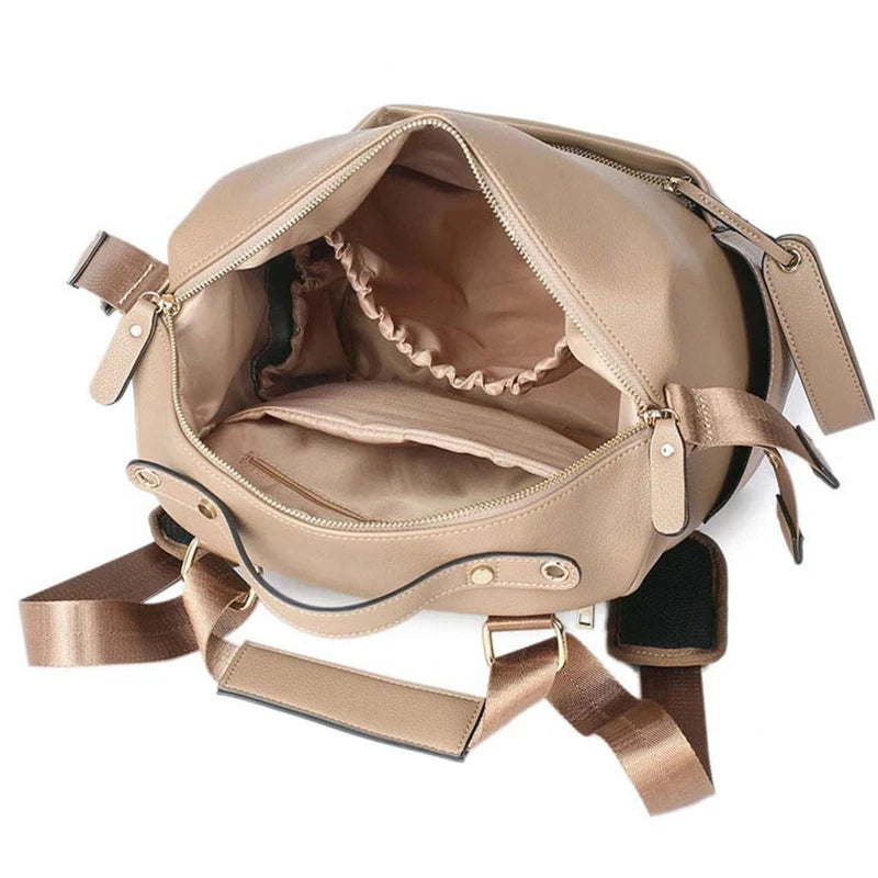 sac a langer en cuir​ marron compartiment